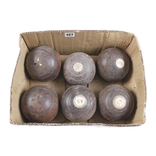 427 - Six lignum bowls G