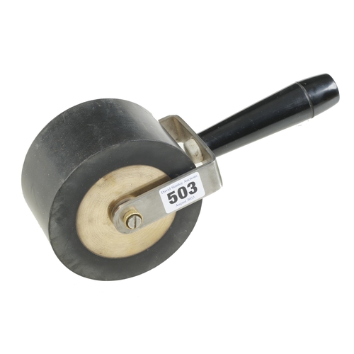 503 - A brass, steel and rubber roller 2 1/2