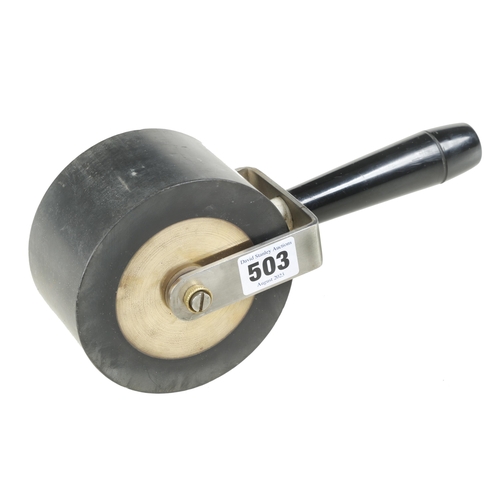 503 - A brass, steel and rubber roller 2 1/2