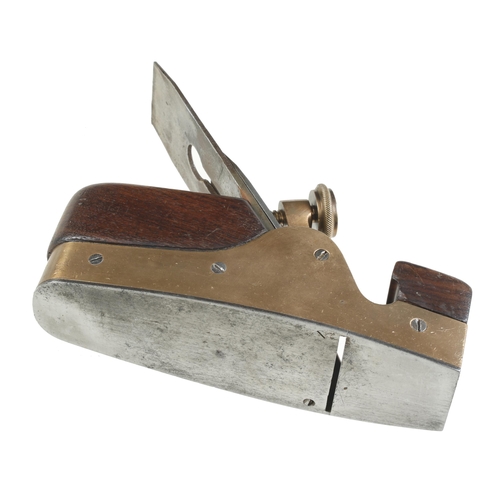 551 - A bronze smoother with ill fitting steel sole, lever marked G MILLER G