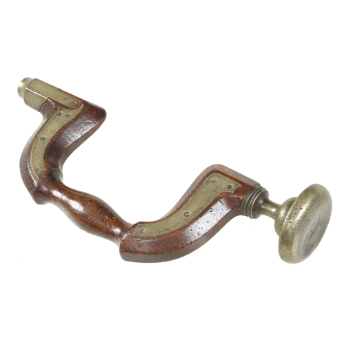 637 - A brass plated beech brace by Jos'h COOPER with large button pad, dent to brass head G