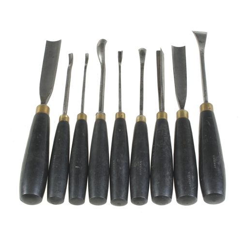 704 - A fine set of 18 carving tools by HENRY TAYLOR with ebony handles G++