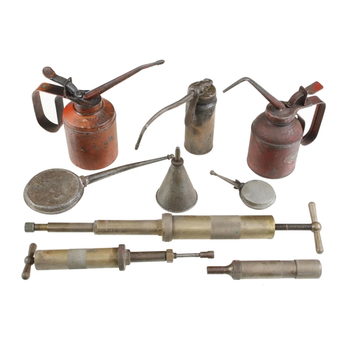 751 - Six oilcans and 3 brass grease pumps G