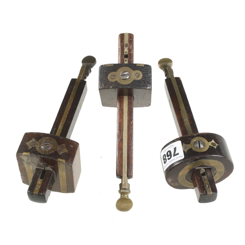 768 - Three rosewood and brass mortice gauges G+