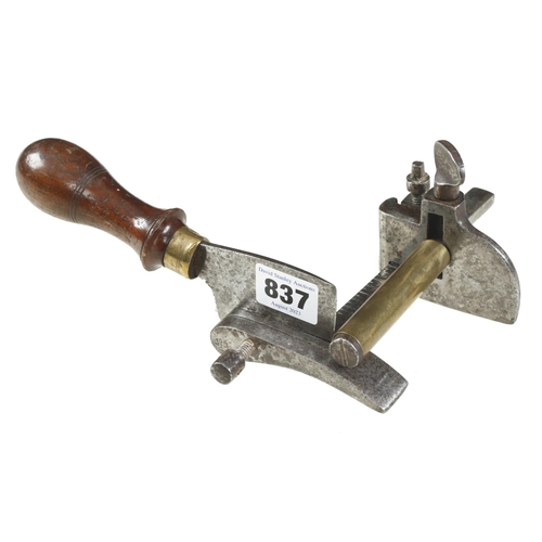 837 - A leather plough gauge with rosewood handle marked Warranted G