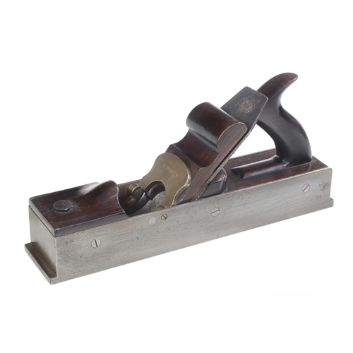 906 - An unusual, super quality, iron panel plane with squared extending toe and heel, figured and shaped ... 