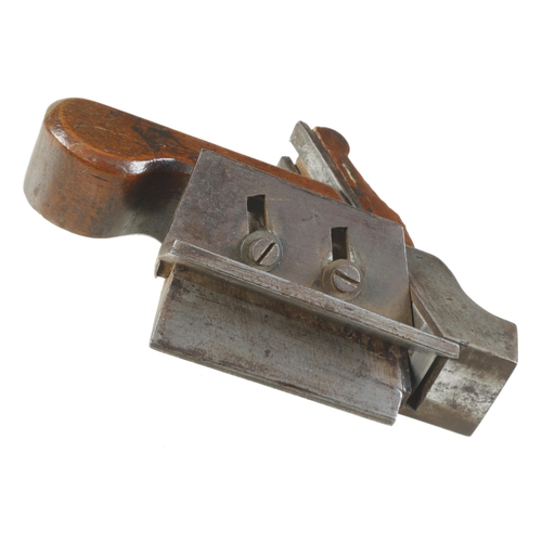 919 - A unusual iron chamfer plane with adjustable fence and mahogany infill and handle, probably workshop... 