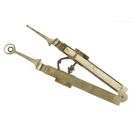 99 - An unusual brass caliper marked RHODES'S Patent No 22 with folding ends and fine adjustment, appears... 