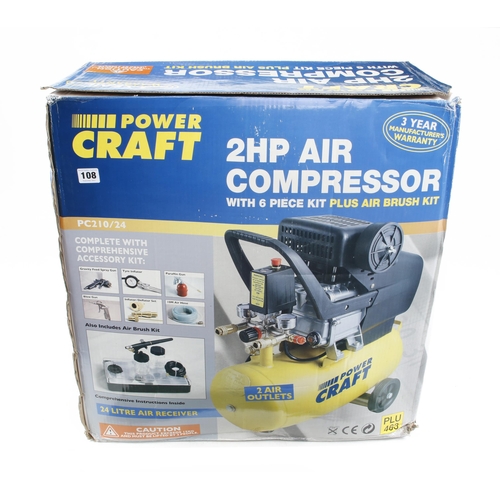 108 - An unused POWERCRAFT 2HP 24 litre air compressor 240v in orig box Pat tested