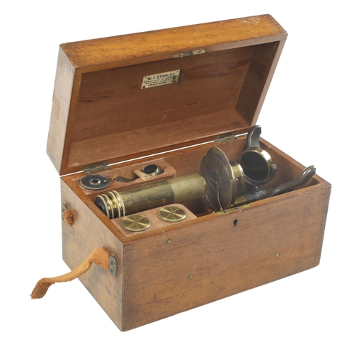 846 - A compound microscope by STANLEY London with various lenses in orig fitted mahogany box t/w a cased ... 