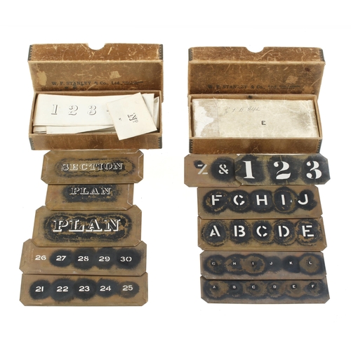 855 - Two sets of brass letters, number etc stencils by STANLEY London, some unopened in orig packets, in ... 