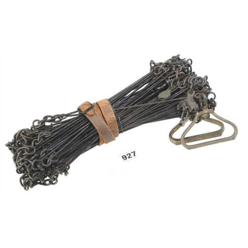 927 - A 100ft land chain with brass handles and tallies G+