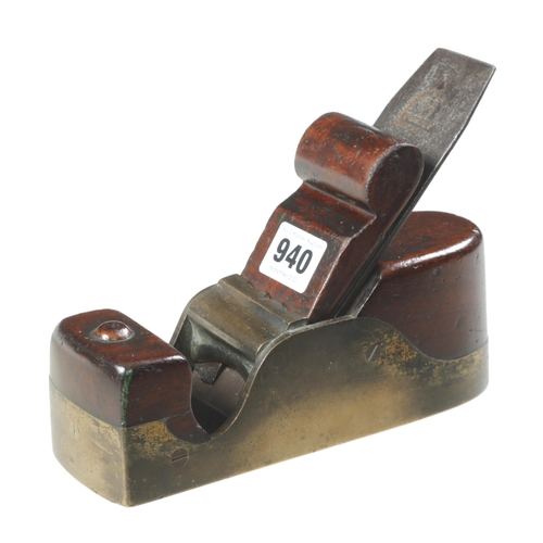 940 - An early, nice quality brass parallel smoother with cupids bow brass lever and mahogany infill and s... 