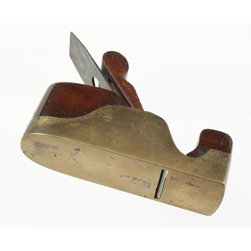 940 - An early, nice quality brass parallel smoother with cupids bow brass lever and mahogany infill and s... 