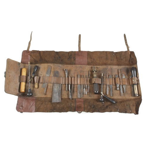 957 - A HOLTZAPFFEL leather tool roll containing 20 tools mostly named, some rust to the minor tools, ex R... 