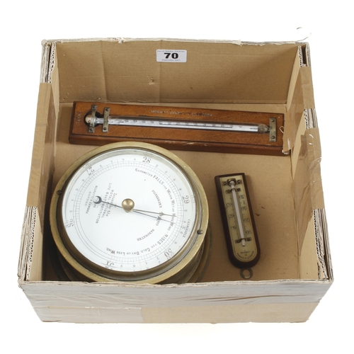 70 - A brass cased aneroid barometer and two thermometers all by NEGRETTI & ZAMBRA G+