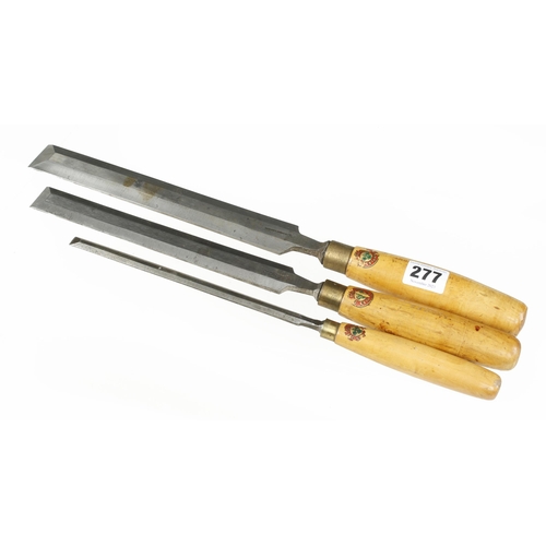 277 - Three bevel edge chisels by MARPLES with trade labels to boxwood handles G+