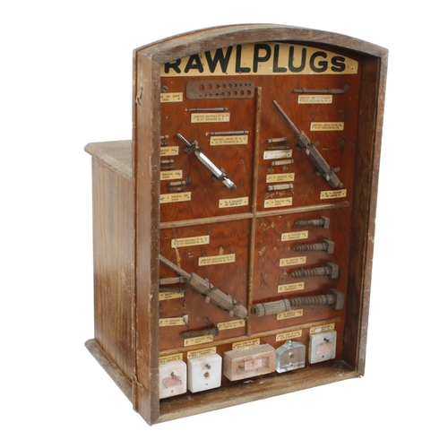 367 - A rare RAWLPLUG oak counter top display cabinet with 4 drawers to the rear complete with contents, r... 