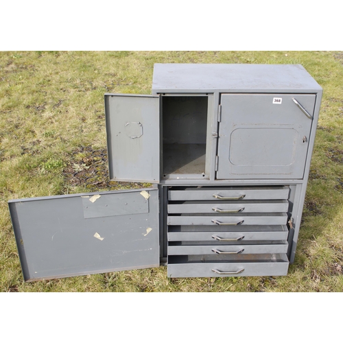 368 - An unusual steel tool cabinet with 12 drawers 24