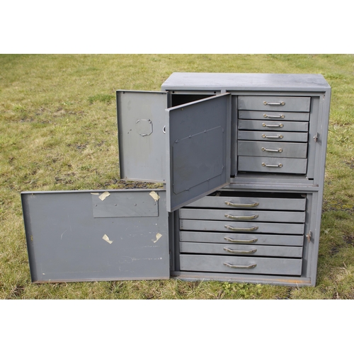 368 - An unusual steel tool cabinet with 12 drawers 24