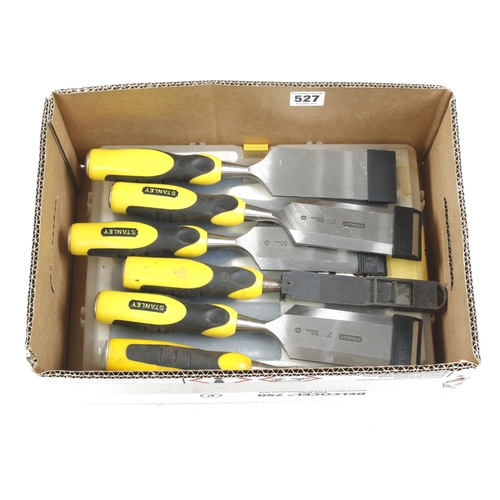 527 - A set of 4 chisels with sharpening stone in fitted case and 4 unused 2