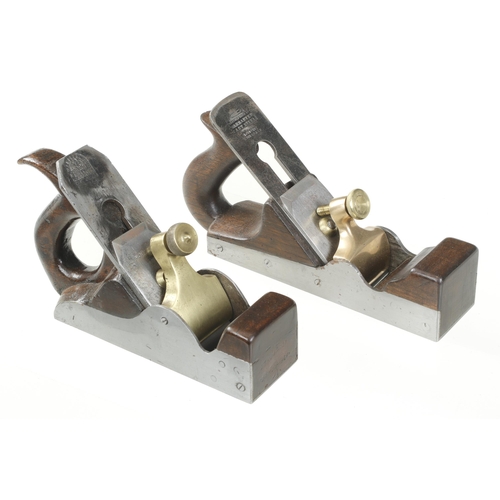 607 - Two parallel iron smoothers with brass levers 8