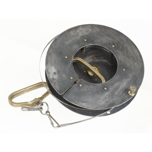 622 - A 100' steel tape by RABONE with brass handles and Broad Arrow and dated 1971 G+