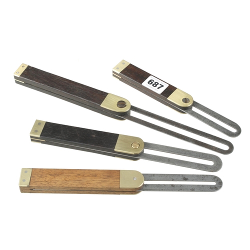 687 - Four rosewood and brass bevels G+