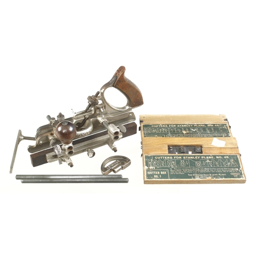 714 - A STANLEY No 45 combination plane c/w 23 cutters in orig card box G+