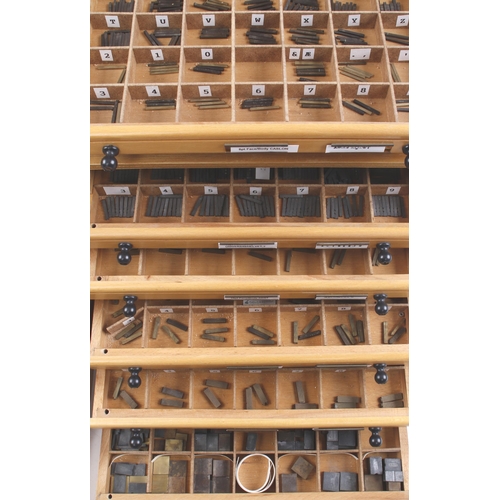 807 - Three chests of compartmented drawers containing numerous brass and metal stamps plus a box of anoth... 