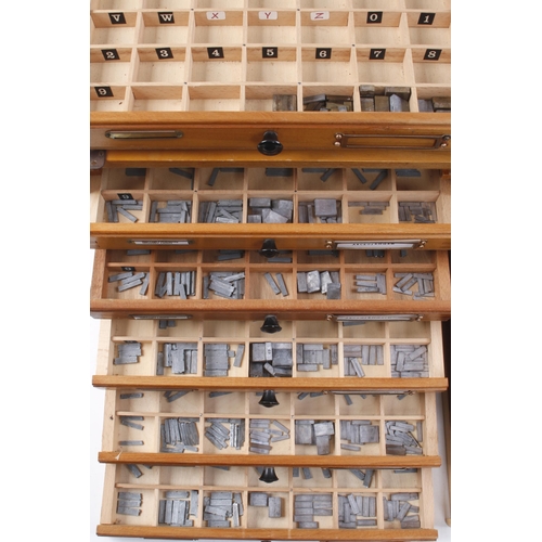 807 - Three chests of compartmented drawers containing numerous brass and metal stamps plus a box of anoth... 