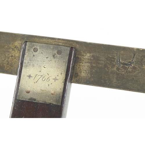 875 - An unusual, 18c mahogany and brass T square dated 1766 with Fleur de Lys decoration, dead right! G