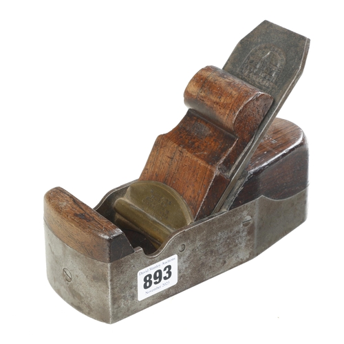 893 - An iron smoother by H.SLATER London with rosewood infill and scrolled wedge G+