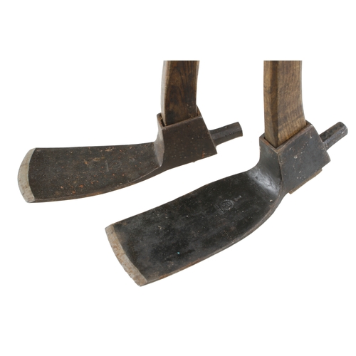 26 - A probably unused pair of adze by GILPIN Nos 1 and 2  with hammer poles and brass ferrules to handle... 
