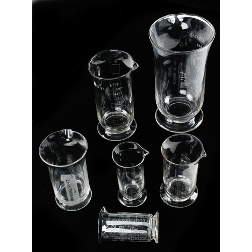 377 - Six Victorian glass measures 100ml, 4 Fl oz, 200cc, 1/2 pt, pt and Quart, not for mailing G++