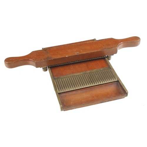 819 - A fine quality and little used mahogany and brass pill roller F