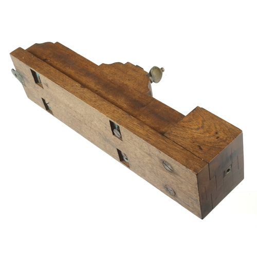 825 - An oak sash dowelling box 13