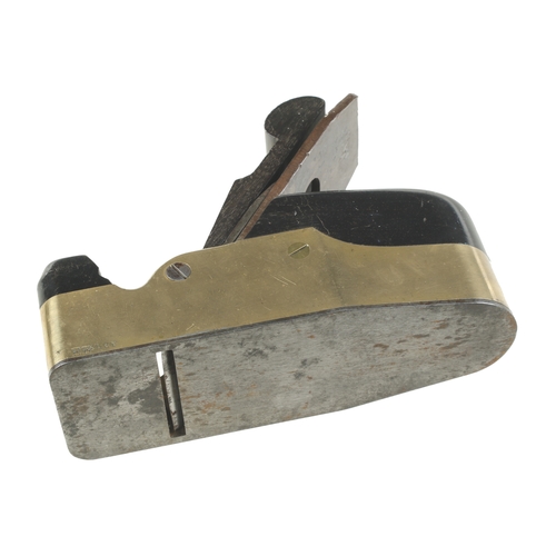 889 - A heavy, nice quality, steel soled gunmetal smoother with ebony infill and scrolled wedge G+