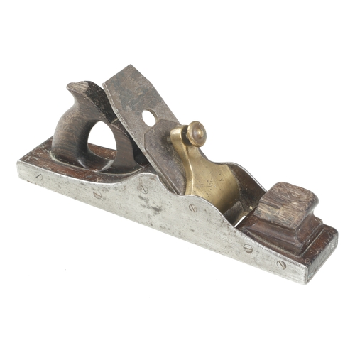 615 - A d/t steel panel plane with brass lever, chips to rosewood infill for restoration G