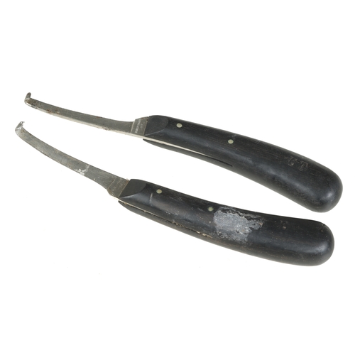 487 - A pair of hoof trimming knives by HAUPTNER with ebony handles in leather case G