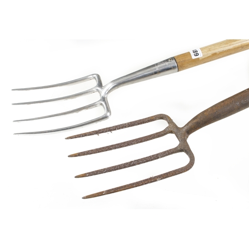 489 - A small stainless steel garden fork by MARPLES and another G+