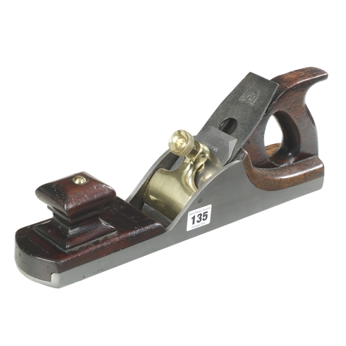 135 - A heavy iron panel plane with brass lever and mahogany infill and Mathieson iron G+