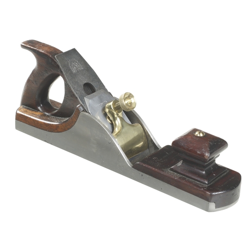 135 - A heavy iron panel plane with brass lever and mahogany infill and Mathieson iron G+