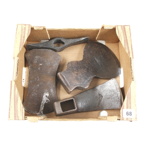 68 - An adze head and 3 axe heads G