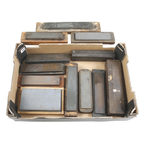 169 - 11 boxed oilstones G+