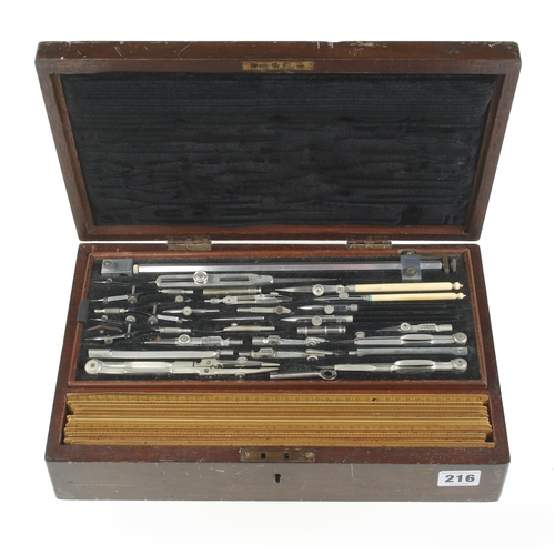 216 - A set of German silver drawing instruments and various rules in lockable mahogany box G