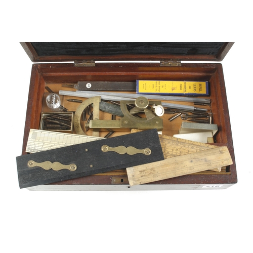 216 - A set of German silver drawing instruments and various rules in lockable mahogany box G