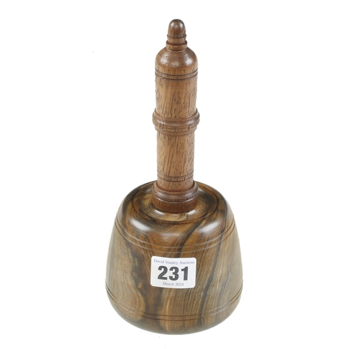 231 - A lignum carving mallet with 4