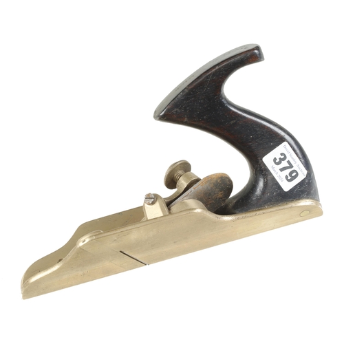 379 - A brass shouldering plane with ebonised handle G+