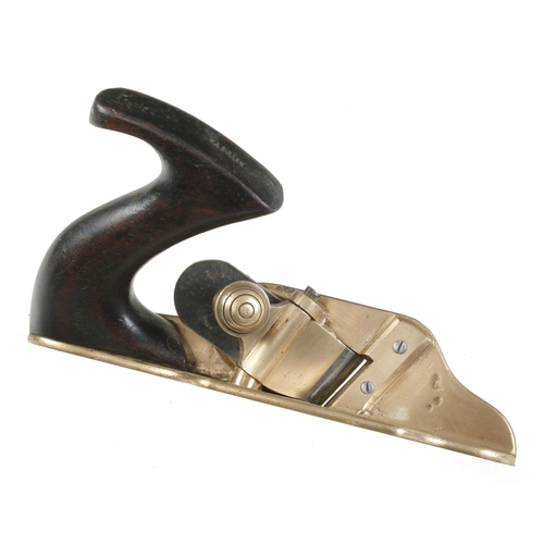 379 - A brass shouldering plane with ebonised handle G+